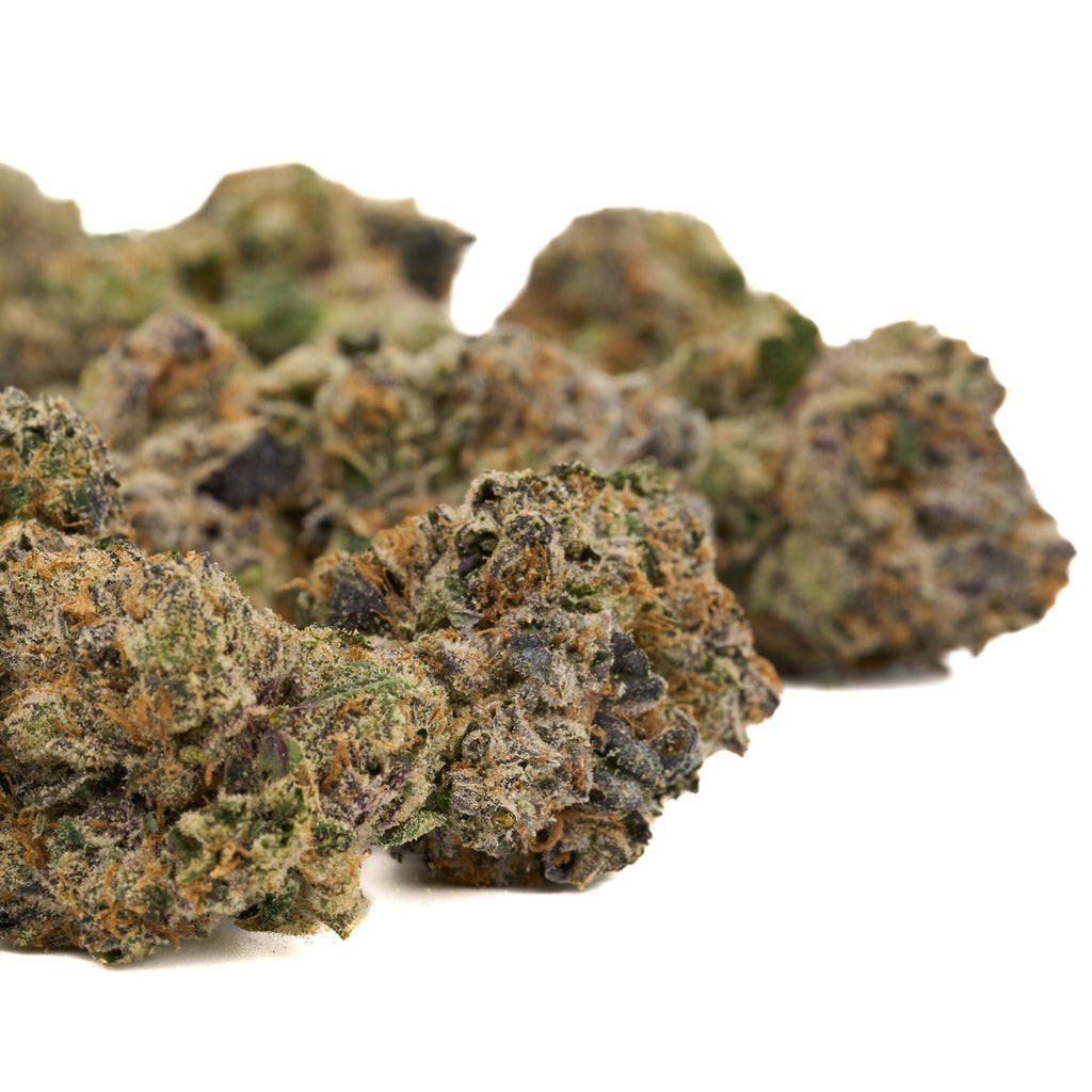 Candy Rain Indoor THCa Flower featuring vibrant buds with orange hairs and trichomes