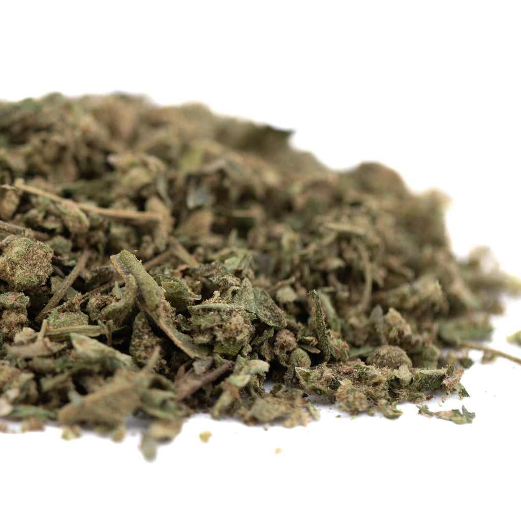 Pile of dried green shredded plant material for Guava Tartz THCA Trim Wholesale 1LB