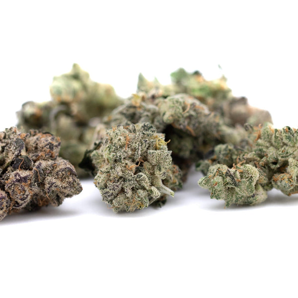 Pile of Sour Garlic Cookies Indoor THCa Flower Smalls cannabis buds for premium enjoyment